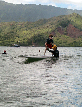Ke'ale working with Petras on proper stance between waves
