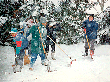 During an Iowa snowstorm Kenneth Jernigan and several blind teenagers shovel snow.