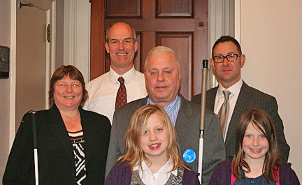 Pictured left to right are Washingtonians Julie Warrington, Congressman Rick Larsen, Ben Prows, Teacher of Tomorrow Michael Dicknite, and (in front) Ben Prow's daughters, Laura and Elizabeth.