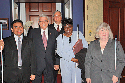 Pictured here left to right are Texans Gabriel Cazares, Representative John Carter, Mike Vandervoort, Athalie Malone, and Norma Crosby.