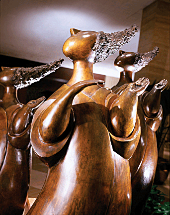 The Gossips is a set of bronze figures outside the Gossip Bar.