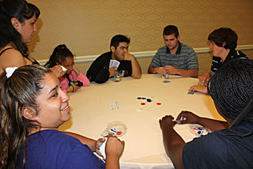 Students play poker at the annual Monte Carlo night sponsored by the National Association of Blind Students.