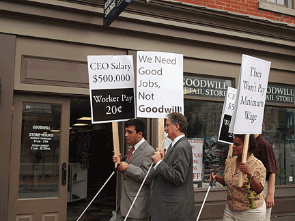 Nijat Worley and Marc Maurer walk the picket line in Baltimore.