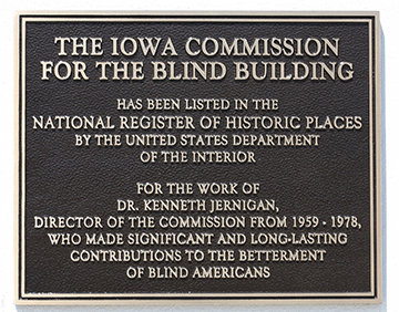 The plaque commemorating the one-hundredth anniversary of the building