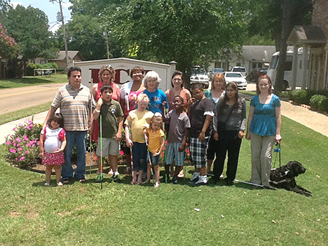 Eric Guillory (left front) with BELL students and teachers.