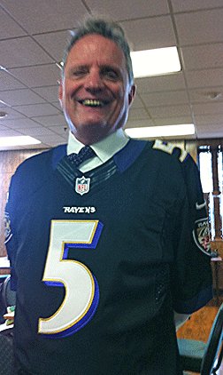 President Maurer shows his pride in the Baltimore Ravens by wearing his Joe Flacco jersey.