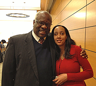 Supreme Court Justice Clarence Thomas posed with Haben Girma