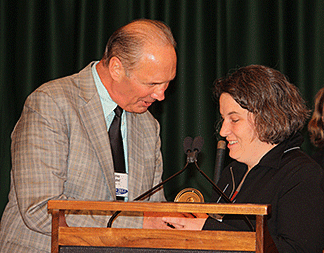 Emily Wharton receives her award from Jim Gashel.