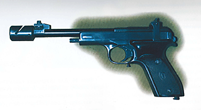 The semi-automatic handgun has a long and thin barrel, with a high front sight at the end of the barrel. The equally high rear sight is mounted on a stationary bridge through which the slide passes as it ejects the fired cartridge case. Though strange in appearance, the high sights were largely responsible for the accuracy of the pistol.