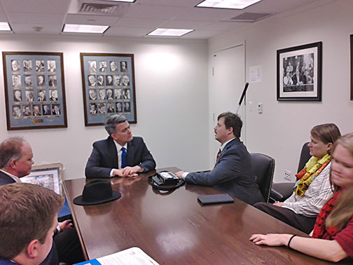 Scott LaBarre and members of the Colorado delegation talk with Representative Mike Coffman