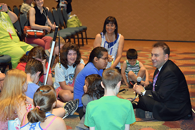 President Riccobono speaks to the children