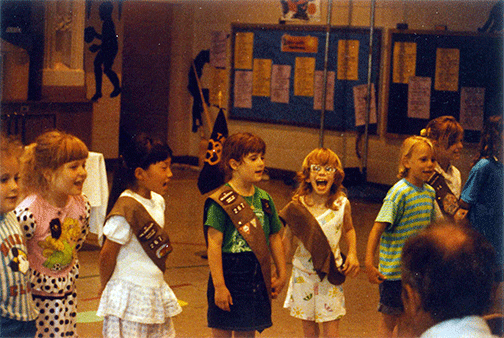 Three members of Elaine&rsquo;s Girl Scout troop at a meeting. From left to right: Missy Wunder, Grace Warn, and Dacia Luck (now Cole).