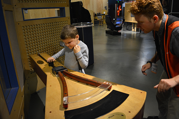 Nick Oliver learns about sound and vibration hands-on at the Exploratorium.