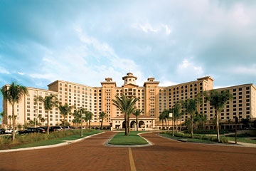 Palm-lined drive leading to front entrance of Rosen Shingle Creek Resort