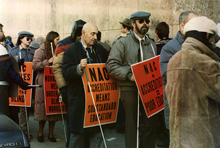 Federationists walk with signs protesting NAC in New York in 1986.