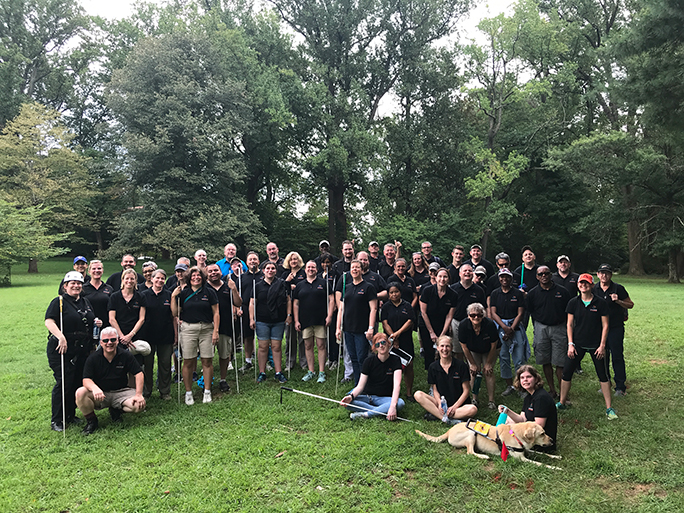 (Almost) the entire staff of the National Center pose together after a great day of teambuilding at Outward Bound.