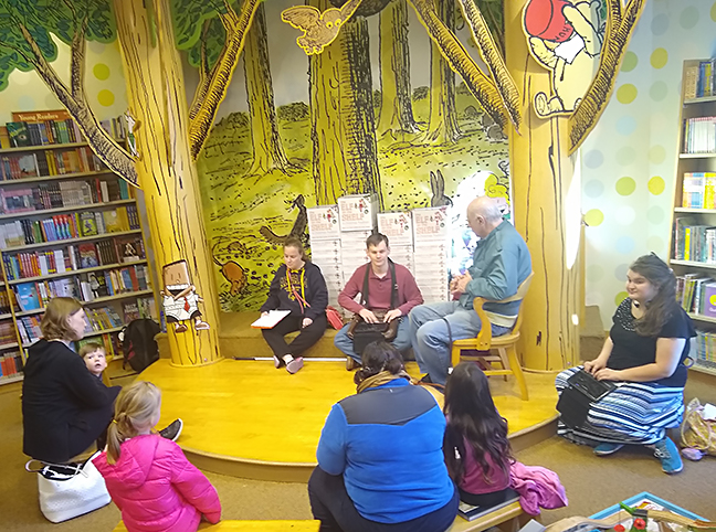 Members of the Capital Chapter discuss the tools they use for reading at the story time reading at Barnes and Noble.