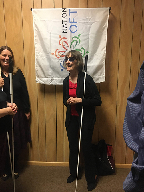 Barbara Loos prepares to unveil the portrait