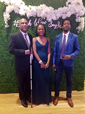 Shawn poses with his now adult siblings.