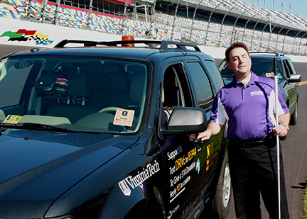 Mark Riccobono getting into the Blind Driver Challenge vehicle