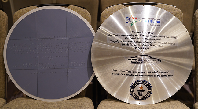 The Braille and print version of the wheel cover Dan Parker presented.