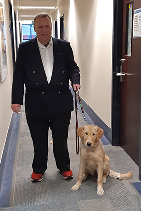 Paul Gabias with his guide dog Kenko