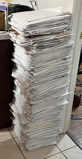 A stack of documents in Braille represent ten weeks of work by twenty-six educators enrolled in one of our Braille Classes.