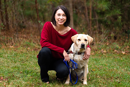 Auna Mayes Namkung with her guide dog.