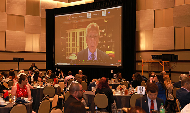 Tony Coelho on the big screen via Zoom.