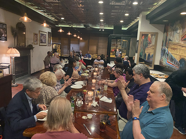 Mark Riccobono gives the September Presidential Release at a Chicago restaurant with many NFB members in attendance.