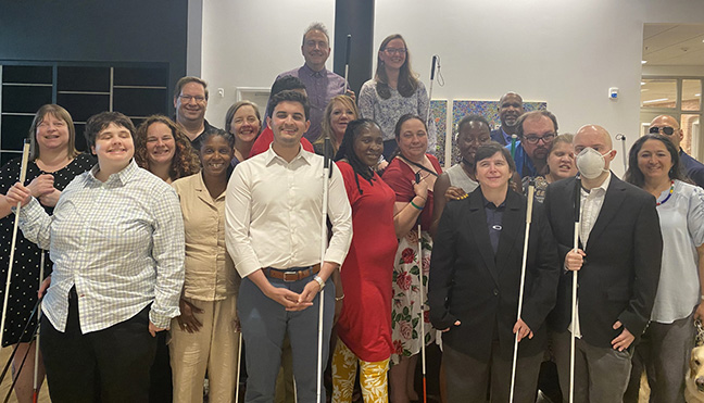The last evening of the Fall 2023 Presidential Leadership Seminar, the Twisted Pilots crowded together for a group photo in the Diane McGeorge Living Room. Left to right, back row moving forward: Mark Riccobono, Grace Anderson, Anil Lewis; Dean Charlier, Cindy Scott-Huisman, Jim Portillo (obstructed), Shirley Dorris, Nick Reisner, Matt Yanuzzi; Denise Charlier, Jessica Beecham, Nikki Jackson, Tina Reisner, Amanda Juetten; Amelia Pellicciotti, Kiva Smith, Syed Rizvi, Rasheta Bunting, Mona Coker, Wendy Walker, Sanho Steele-Louchart.