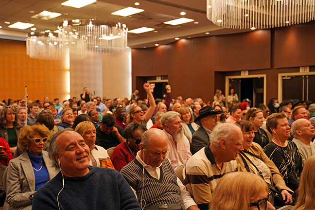 The large crowd smiles and cheers during the Great Gathering-In.