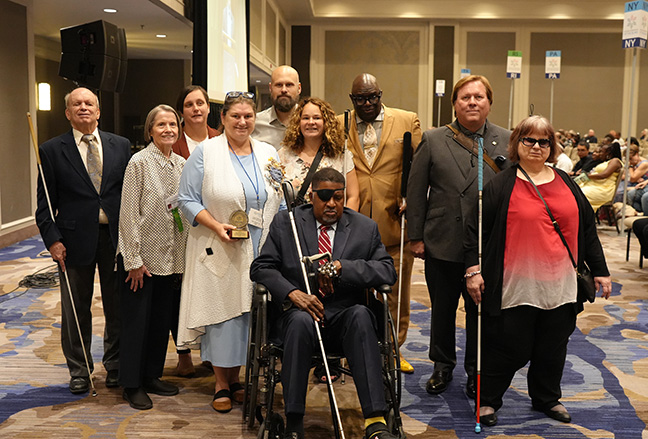 The 2025 Bolotin Award winners pose for a photo with the Bolotin committee members. Left to right: Steve Jacobson, Mary Ellen Jernigan, Mika Baugh, Casey Robertson, Sam Seavey, Jessica Beecham, Donald Porterfield, Lee Martin, Everette Bacon, and Diane Graves.