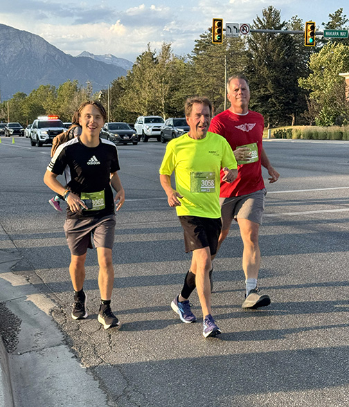 Ken Duke runs a half marathon with friends.