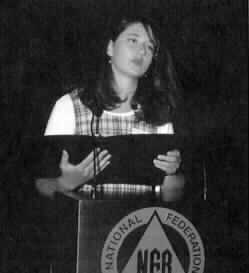 Photo of Cheralyn Braithwaite at the podium