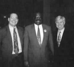 Picture of three UPS employees.