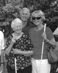 Photo of Mary Main, Bruce 
Woodward, and NFB of Connecticut President Betty Woodward