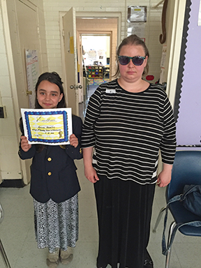 Misty Bradley and her daughter share a proud moment at school. 