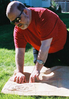 Robert Jaquiss examines one of his treasures - a home-made tactile map created by his father.