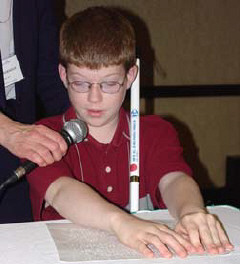 The celebration program convened with a panel titled "Braille Rules" in which three blind youngsters, including seven-year-old Bryce Gitzen from Washington State, entertained the audience with lively presentations which they read in Braille.