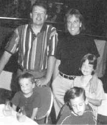  Burt and Melanie Manwaring shown with 

their children.(19995 bytes)