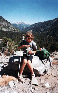 Stopping for a water break on a backpacking trip. (Kyra, age 9)
