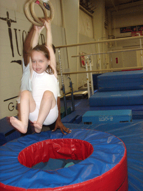 Gymnastics is a popular sport that is introduced at an early age. Kendra Holloway (age 4 1/2, Atlanta, GA) shows that getting on this particular bandwagon is fun and can develop a love for fitness far into the future.