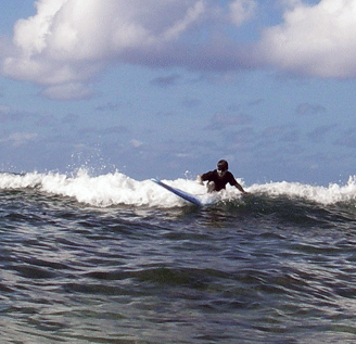 Vejas, age eight, still loves to surf.