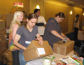 The Braille Book Flea Market is only made possible through help from committed volunteers that help unload, sort, and box Flea Market browsers� selections.