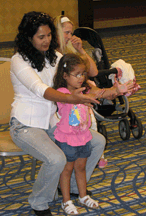 Eridan Monteiro and her daughter, Maria Louisa, age 4, (Georgia), learn that positive movement and focused energy not only stimulates the body, but also the mind