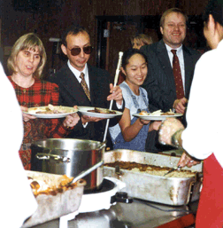 Moving through a serving line is just one scenario that a blind student can and should master through proper instruction and experience. The management of the various utensils and a tray, as well as the cane, is an important example of independence in public spaces.