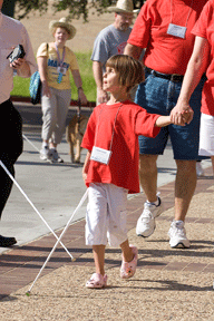 Lindsay Adair marches with her cane.