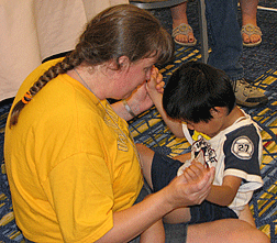 Barbara Hammel plays with her son, Jesse.