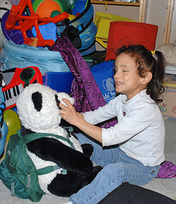 Milagro at age six still enjoys her Perkins Panda.